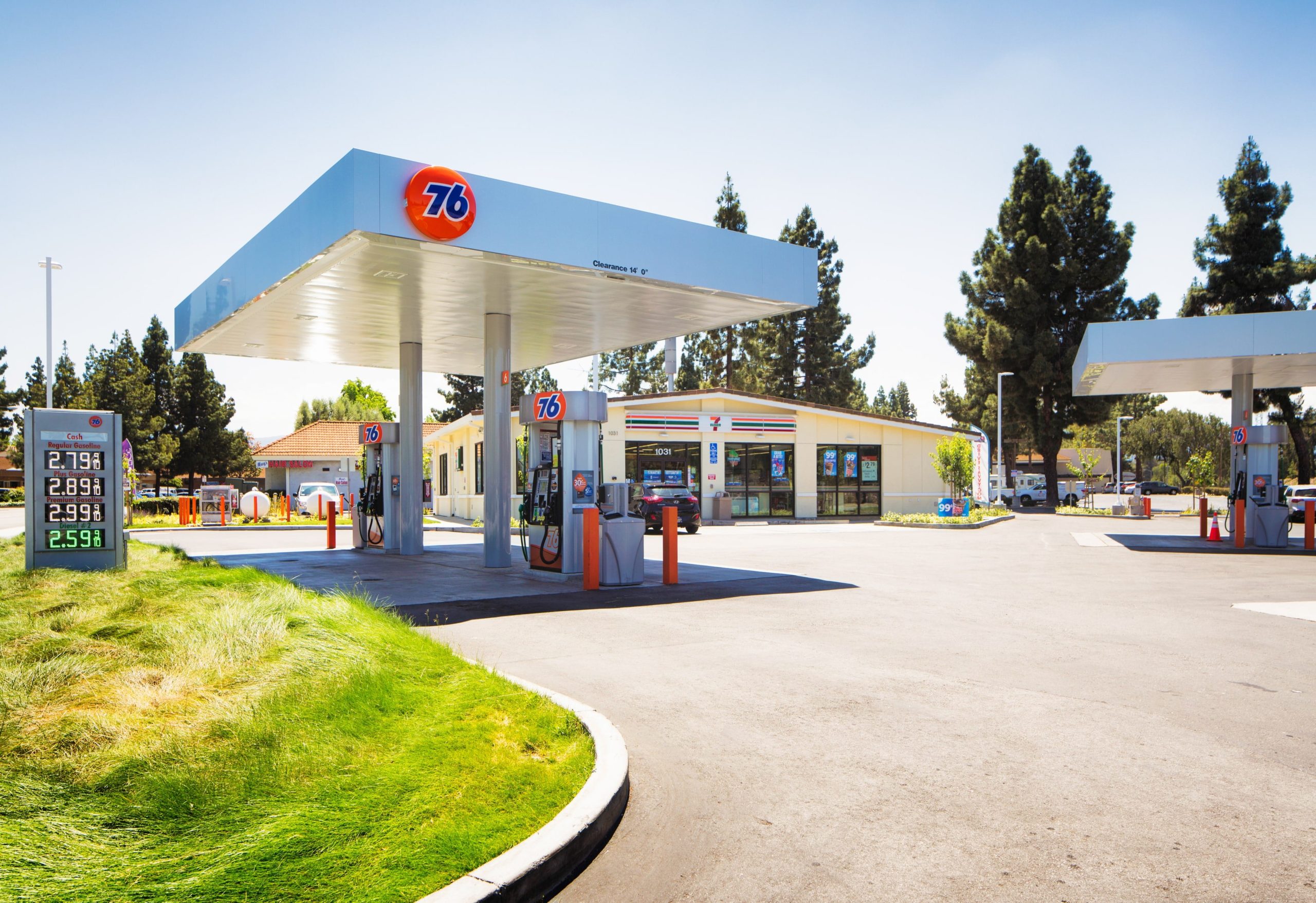 Brand new gas station in Los Angeles with four gas pumps and a convenience store