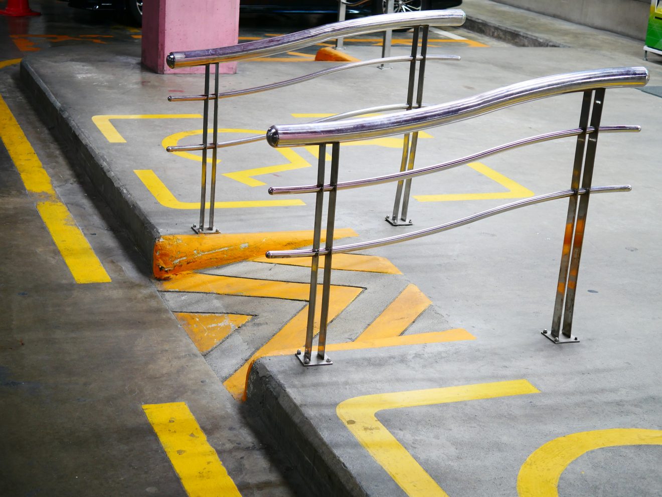 handicap accessible curb ramp railing sidewalk