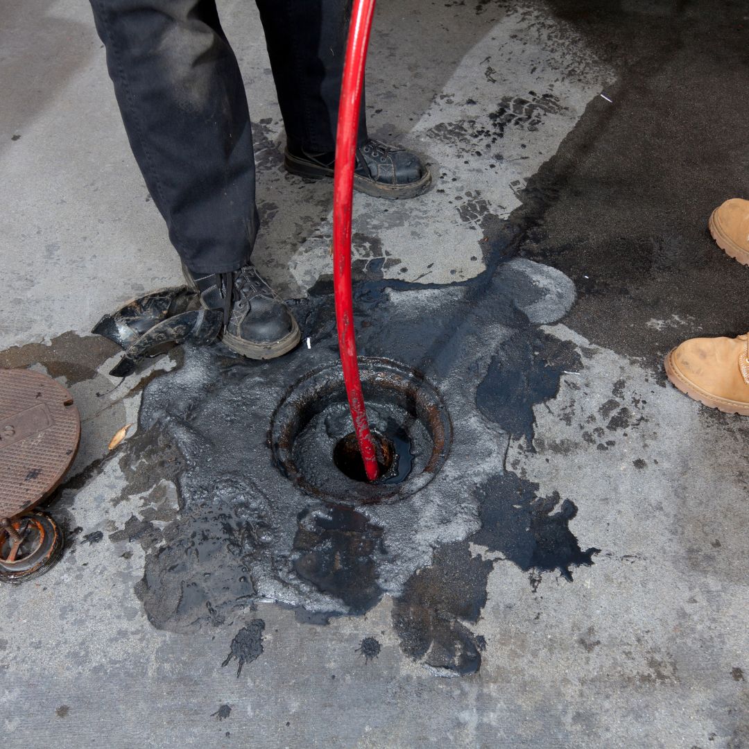 Image showcasing commercial plumbing installation, with plumbers working on a project, installing pipes and fixtures in a commercial building to ensure efficient water supply and drainage.